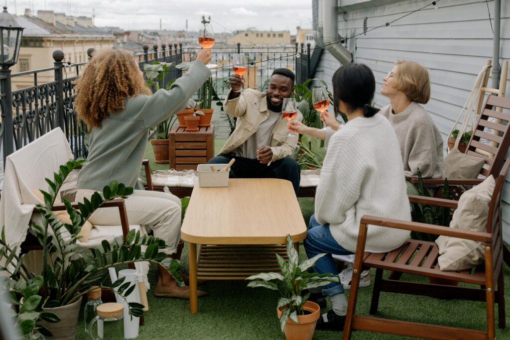 people sitting at a table enjoying wine